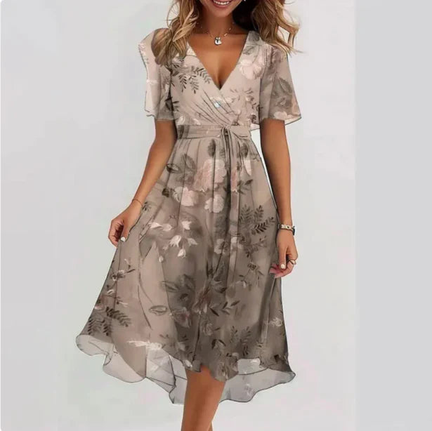 Mittellanges Kleid mit Wickeloptik, kurzen Ärmeln und Allover-Muster