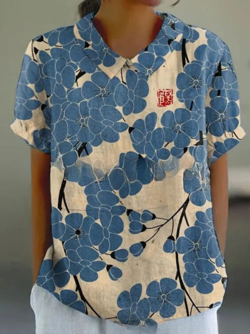Kurzärmelige Bluse mit Knopfleiste und floralem Muster