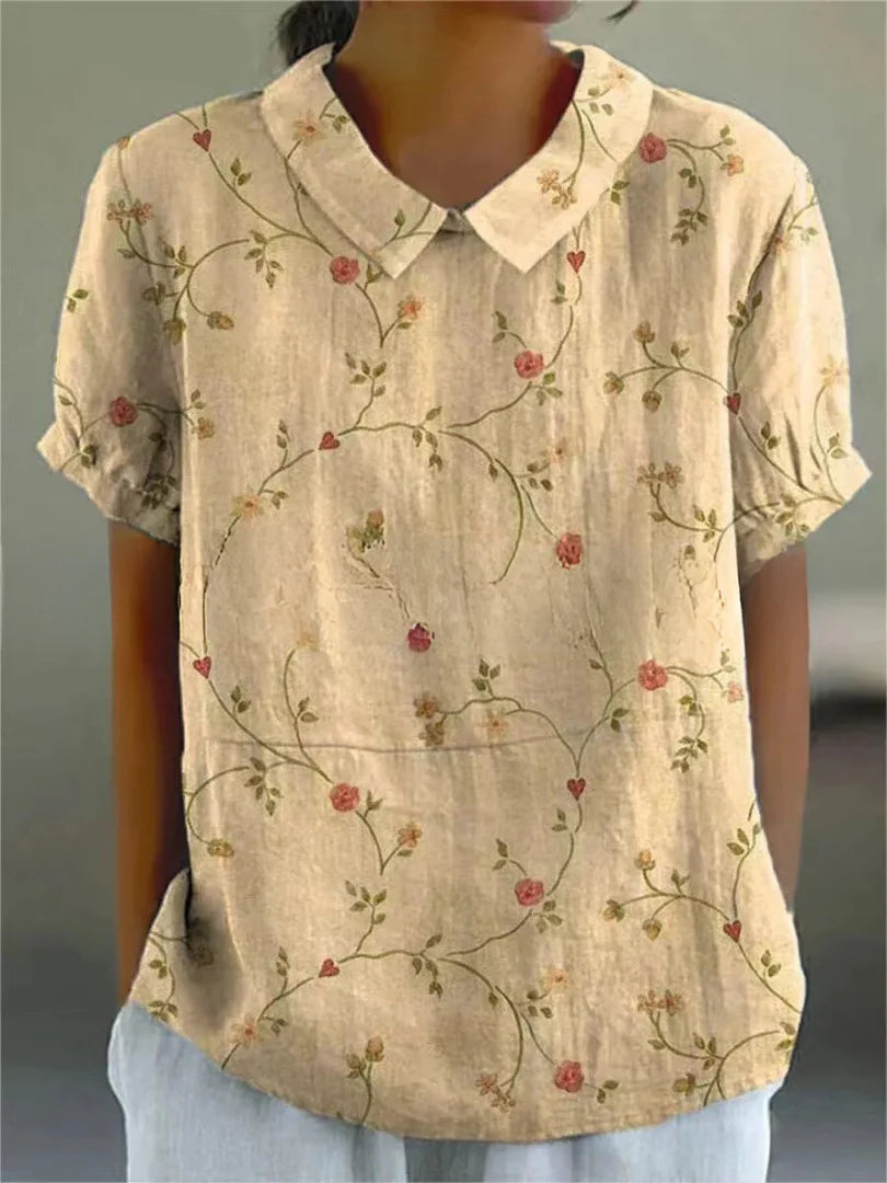 Kurzärmelige Bluse mit Knopfleiste und floralem Muster