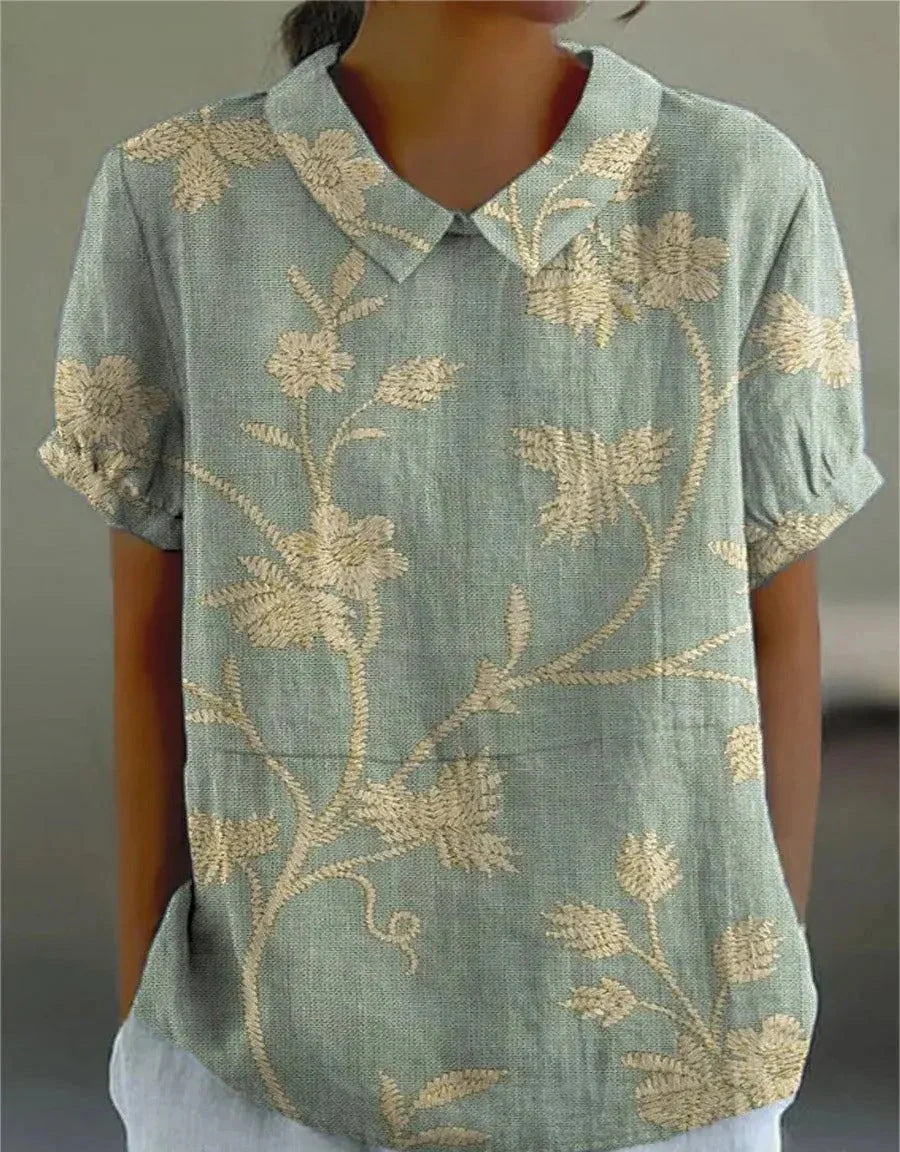 Kurzärmelige Bluse mit Knopfleiste und floralem Muster