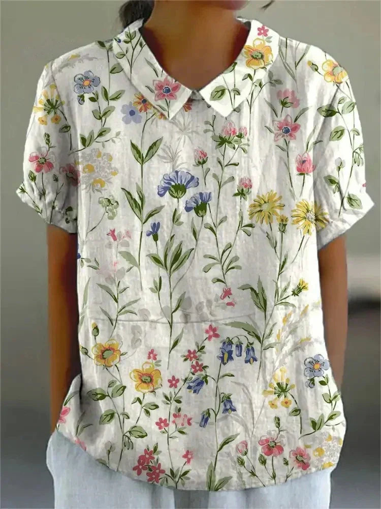 Kurzärmelige Bluse mit Knopfleiste und floralem Muster