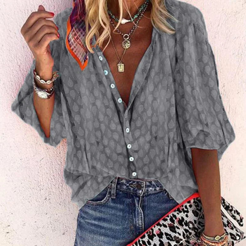 Damenbluse mit Muster, Knopfleiste und V-Ausschnitt