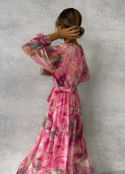 Lang geschnittenes Kleid mit transparenten Ärmeln und Bindegürtel