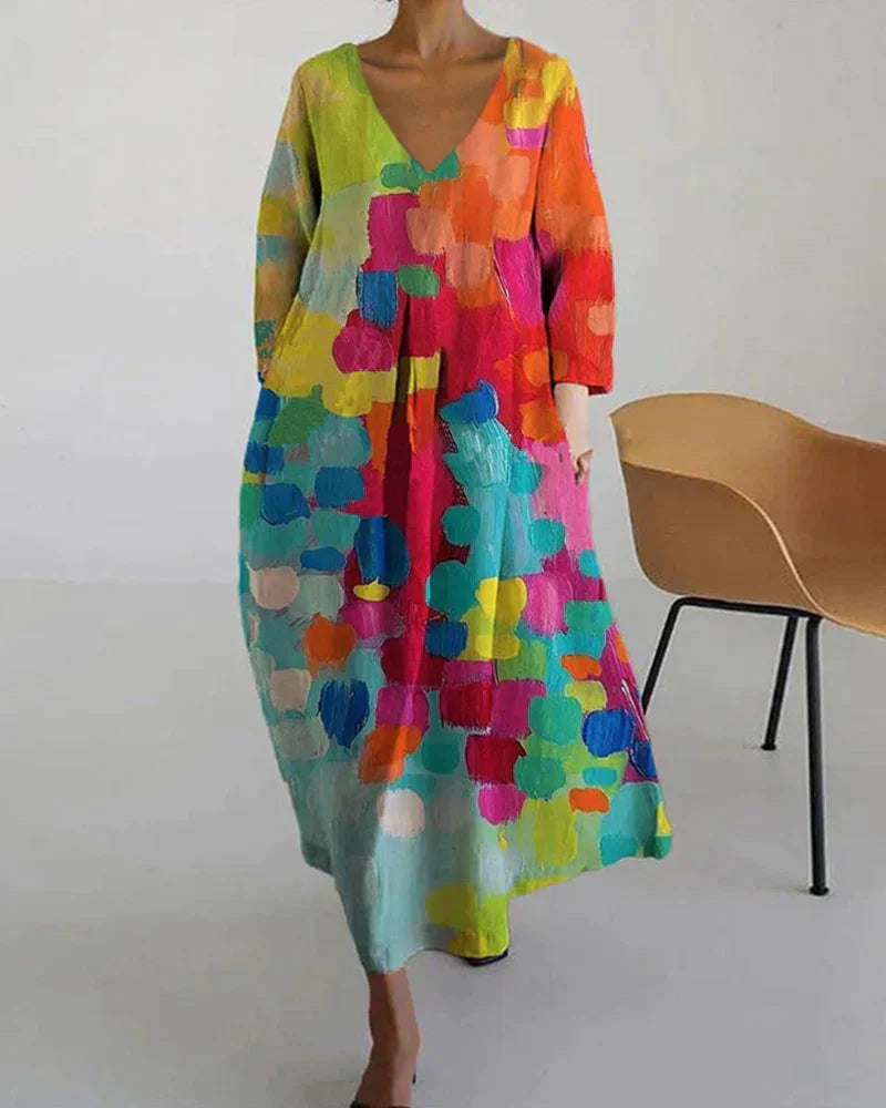 Weit geschnittenes Maxikleid mit V-Ausschnitt, Dreiviertelärmeln und abstraktem Muster