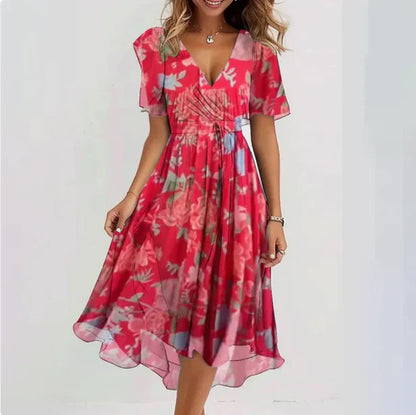 Mittellanges Kleid mit Wickeloptik, kurzen Ärmeln und Allover-Muster
