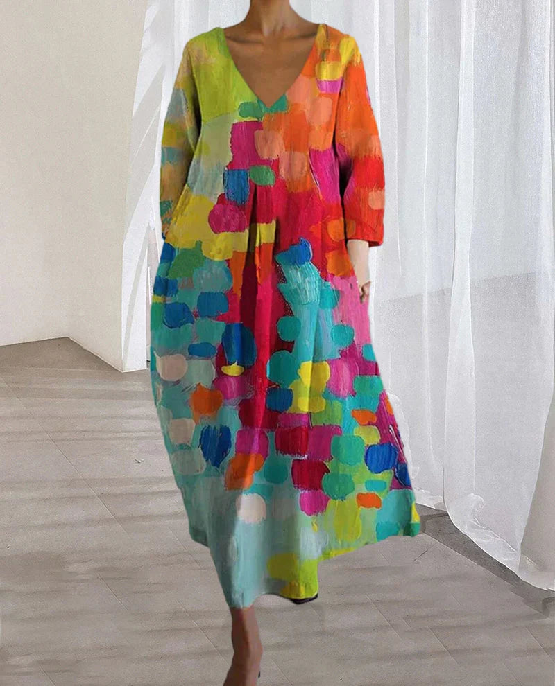 Weit geschnittenes Maxikleid mit V-Ausschnitt, Dreiviertelärmeln und abstraktem Muster