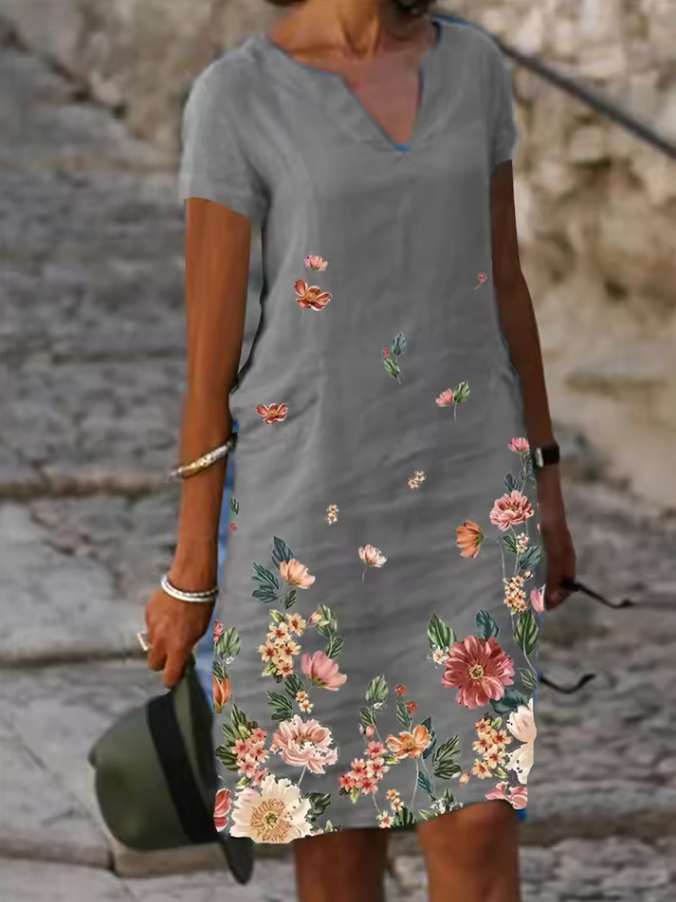 Knielanges Kleid mit V-Ausschnitt und floralen Details