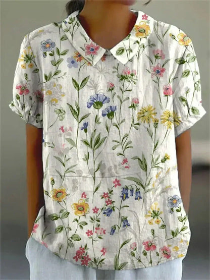 Kurzärmelige Bluse mit Knopfleiste und floralem Muster